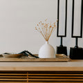 Lune tray styled with simple ceramic vessels