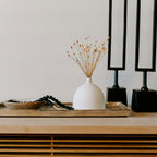 Lune tray styled with simple ceramic vessels