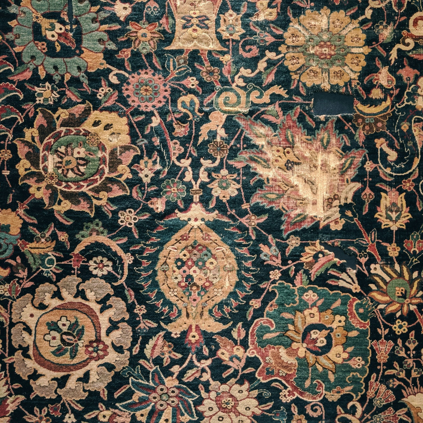 Heritage patterned flatweave rug in a bright living room