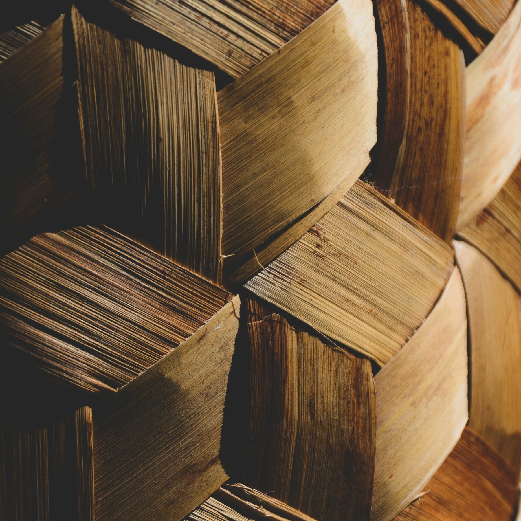 Kora woven basket filled with dried botanicals