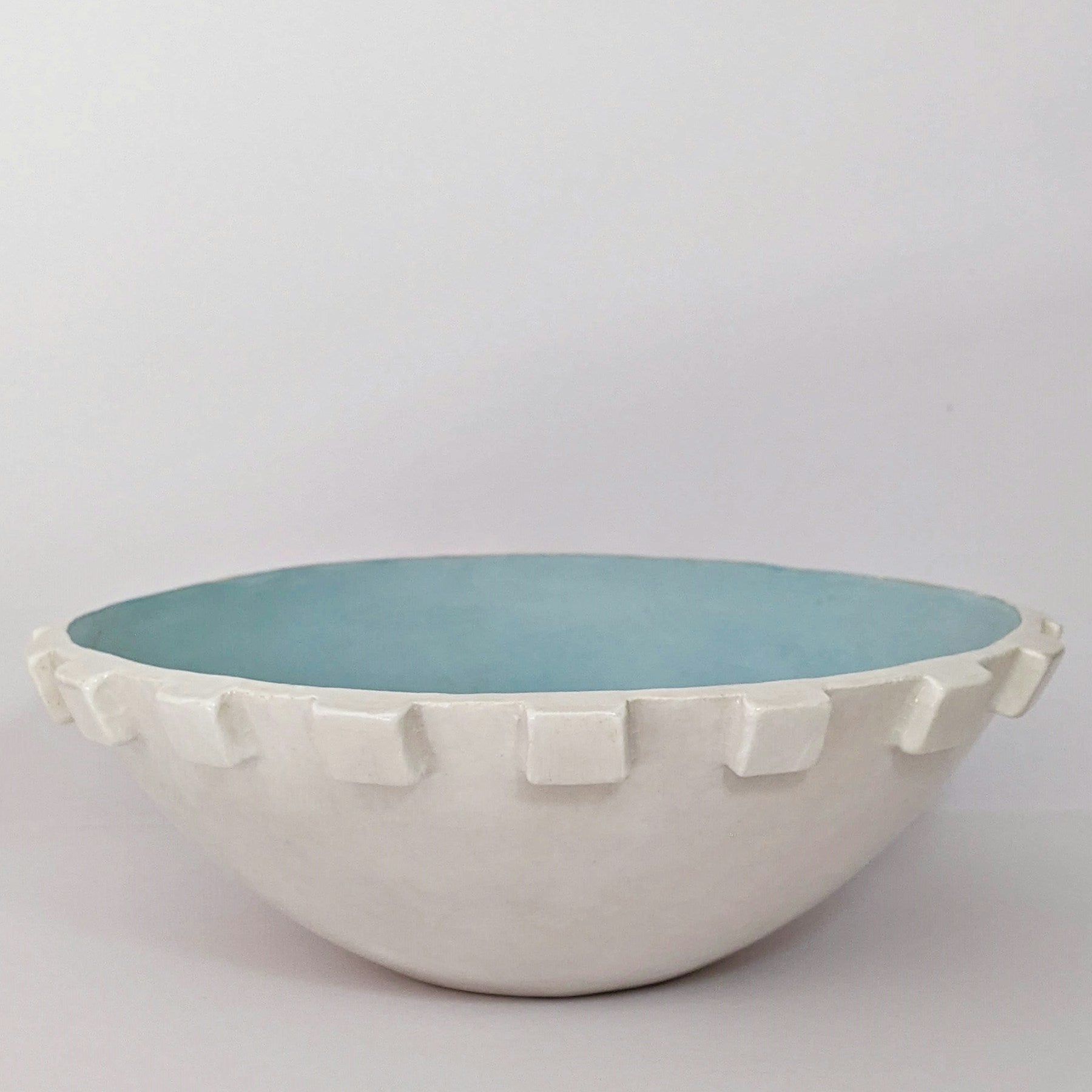 Arlo footed bowl in a pale chalk glaze