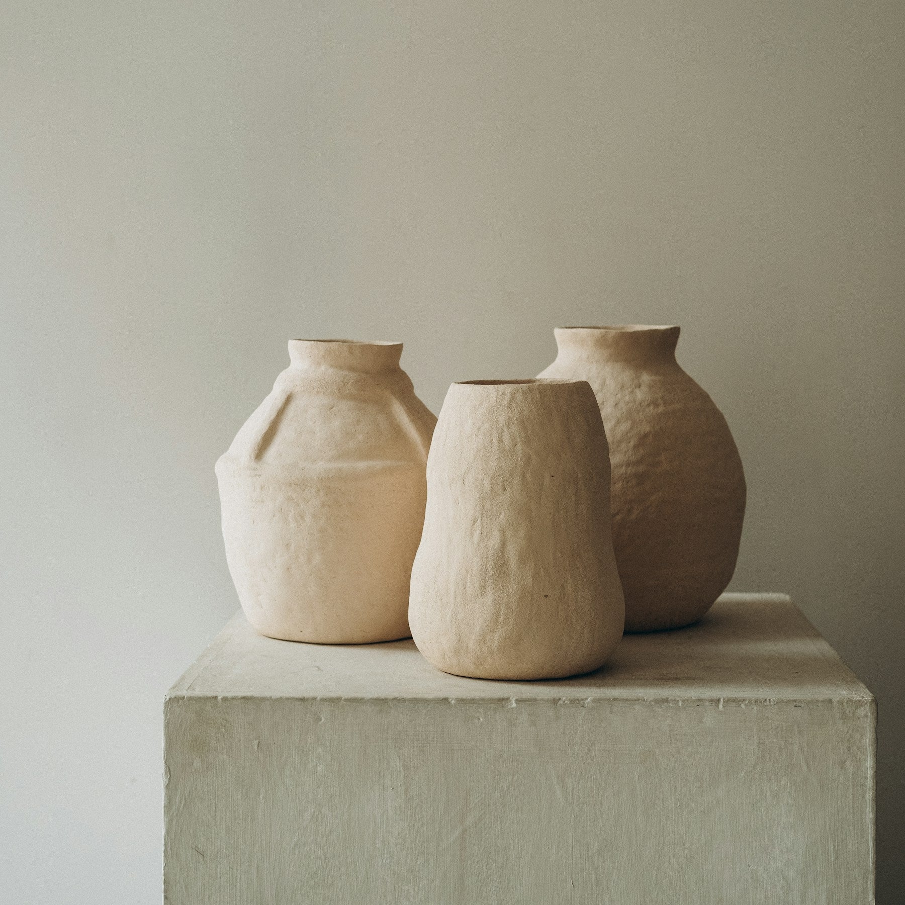 Neutral Sora ceramic vases displayed on a plinth