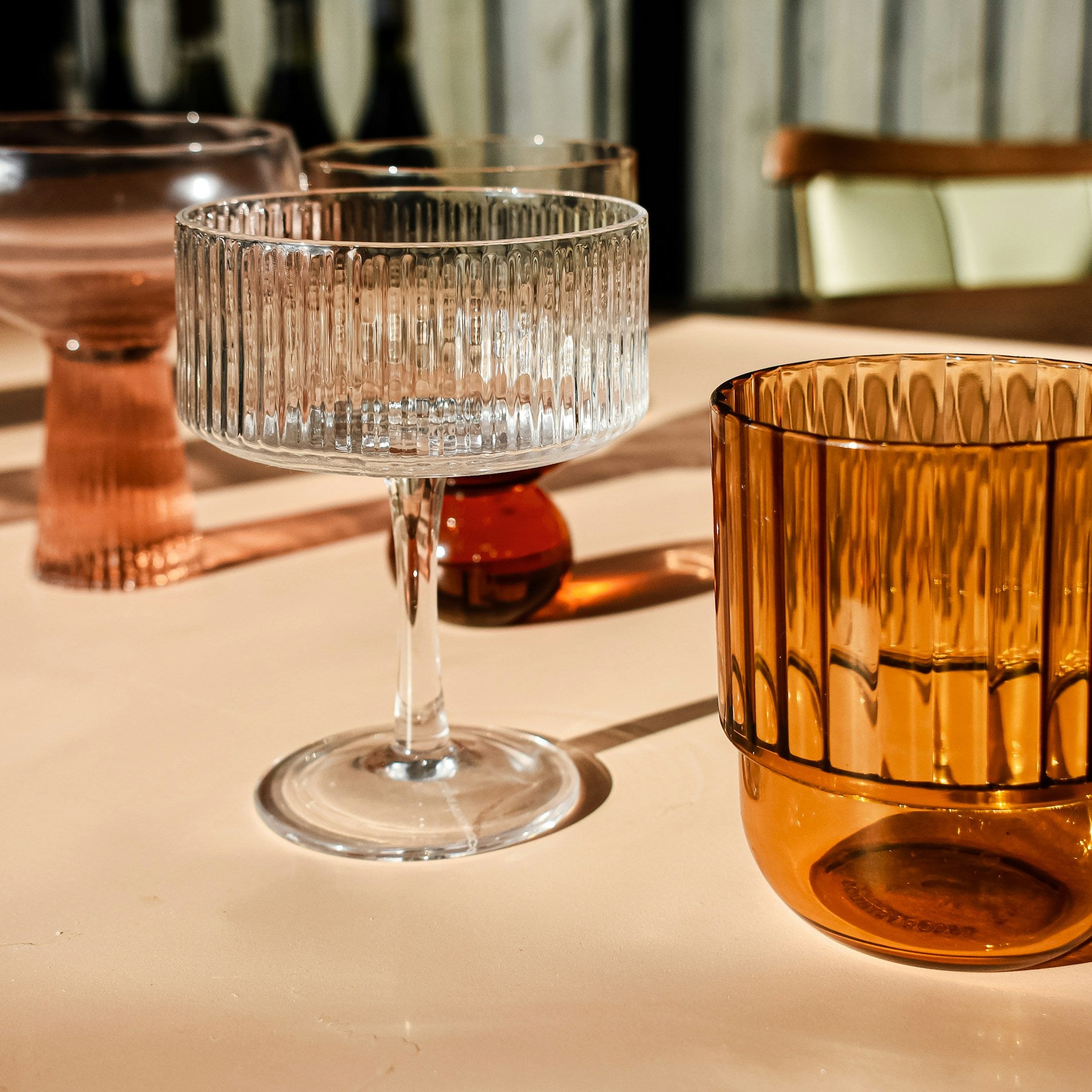 Amber and clear Ripple glasses styled together